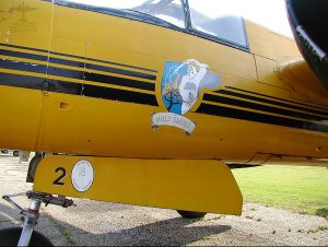 Photo by John Olafson showing 44-35898's nose art while in the service of Air Spray, Ltd.