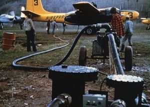 Tanker #3 (center) flanked by Tanker #10 (in white, left) and Tanker #9 (right) sometime before 1982.