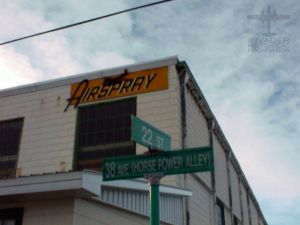 A photo showing the original Airspray logo on their headquarters building in Edmonton, Canada.