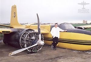 An unknown person standing next to Tanker #3 after the crash.